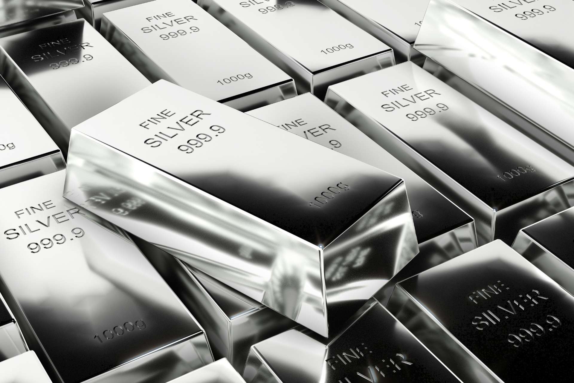 close up of several neatly arranged silver ingots